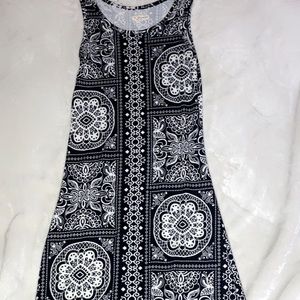 This is a dress that is tight around the waist and loose at the bottom